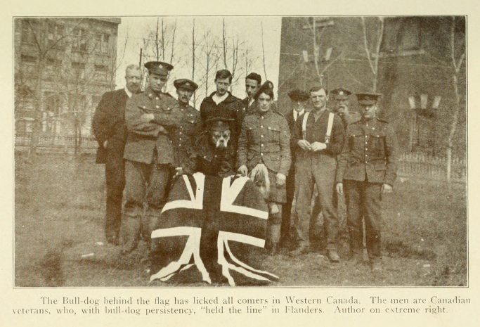 The Bull-dog behind the flag has licked all comers in Western Canada. The men are Canadian veterans, who, with bull-dog persistency, "held the line" in Flanders Author on extreme right.